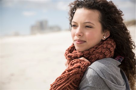 simsearch:649-08924209,k - Young woman wrapped in scarf looking out to sea from beach, Western Cape, South Africa Stock Photo - Premium Royalty-Free, Code: 649-08840208