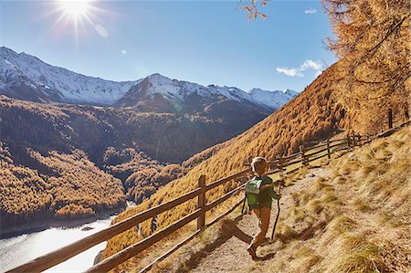 simsearch:649-08086253,k - Young boy hiking along pathway, rear view, Schnalstal, South Tyrol, Italy Stock Photo - Premium Royalty-Free, Code: 649-08840518