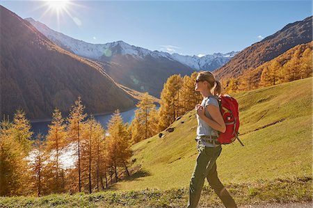 simsearch:649-08900720,k - Woman hiking, looking at view, Schnalstal, South Tyrol, Italy Stock Photo - Premium Royalty-Free, Code: 649-08840526