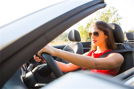 simsearch:649-07280823,k - Young woman driving on rural road in convertible, Majorca, Spain Stock Photo - Premium Royalty-Free, Code: 649-08840804