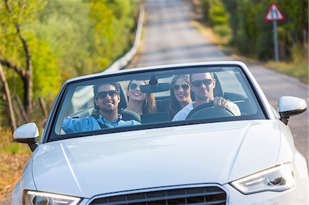 simsearch:649-07280823,k - Four adult friends driving on rural road in convertible, Majorca, Spain Stock Photo - Premium Royalty-Free, Code: 649-08840800