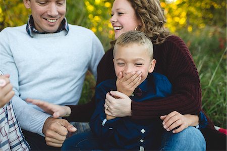 Family hugging and smiling Stock Photo - Premium Royalty-Free, Code: 649-08859589