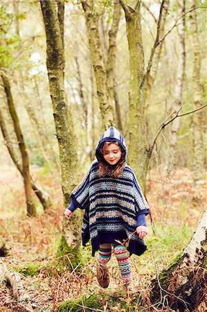 poncho - Young girl, walking through forest Stock Photo - Premium Royalty-Free, Code: 649-08901723