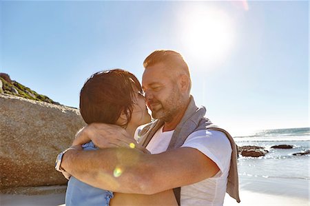 simsearch:614-07239972,k - Mature couple hugging on beach, Cape Town, South Africa Stock Photo - Premium Royalty-Free, Code: 649-08901849