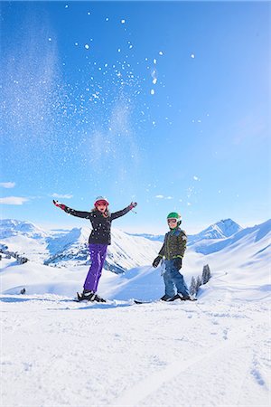 simsearch:649-06812049,k - Portrait of skiing teenage girl and brother throwing powder snow in Swiss Alps, Gstaad, Switzerland Stock Photo - Premium Royalty-Free, Code: 649-08924175