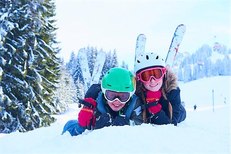 simsearch:649-07239584,k - Portrait of skiing teenage girl and brother lying in snow, Gstaad, Switzerland Stock Photo - Premium Royalty-Free, Code: 649-08924179