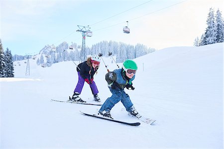 simsearch:649-06812049,k - Teenage girl and brother skiing down ski slope, Gstaad, Switzerland Stock Photo - Premium Royalty-Free, Code: 649-08924180
