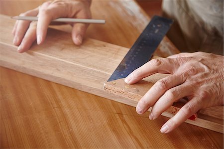 simsearch:649-07710266,k - Hands of male carpenter using set square at workbench Stock Photo - Premium Royalty-Free, Code: 649-08924251