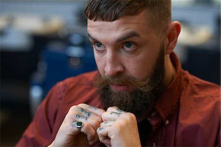 simsearch:614-08392638,k - Portrait of tattooed bearded man Stock Photo - Premium Royalty-Free, Code: 649-08950030