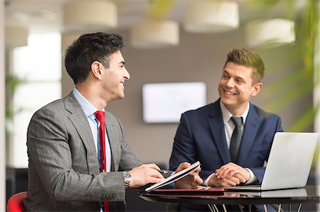 simsearch:649-07238396,k - Two businessmen meeting in boardroom Stock Photo - Premium Royalty-Free, Code: 649-08968792