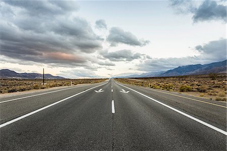simsearch:700-03891190,k - Straight road with direction arrows in Death Valley National Park, California, USA Stock Photo - Premium Royalty-Free, Code: 649-08968963