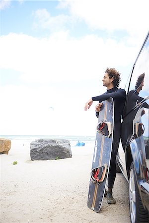 sports events - Kite surfer in wetsuit leaning against car, Hornbæk, Hovedstaden, Denmark Photographie de stock - Premium Libres de Droits, Code: 649-08969373