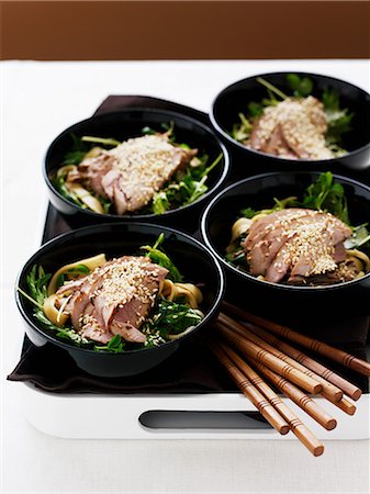 simsearch:649-06352937,k - Bowls of pork fillets with noodle salad Stock Photo - Premium Royalty-Free, Code: 649-09004070