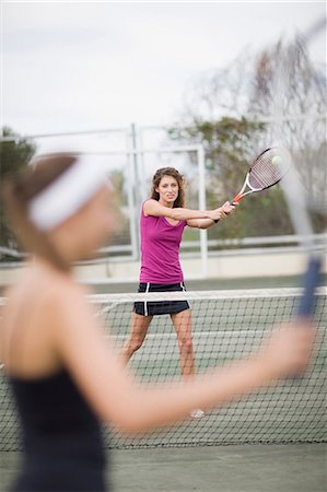 simsearch:640-06050635,k - Serious girl playing tennis Stock Photo - Premium Royalty-Free, Code: 649-09002607
