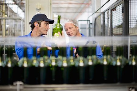 simsearch:649-07238739,k - Workers checking bottles in factory Stock Photo - Premium Royalty-Free, Code: 649-09002636