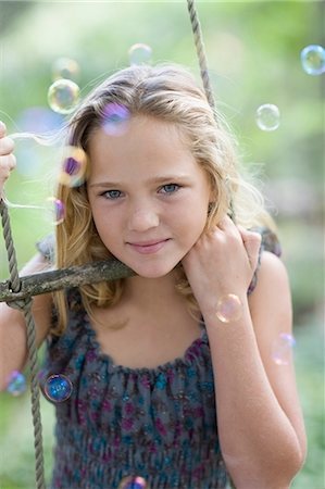 simsearch:649-05819818,k - Girl climbing rope ladder with bubbles Stock Photo - Premium Royalty-Free, Code: 649-09002679