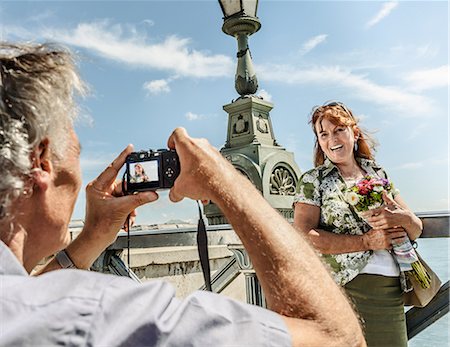 simsearch:6113-06498180,k - Older man taking picture of wife Stock Photo - Premium Royalty-Free, Code: 649-09003278