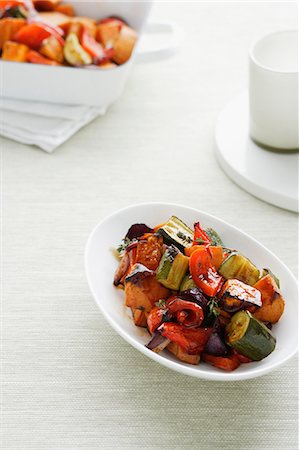 simsearch:649-06352937,k - Bowl of roasted vegetables on table Stock Photo - Premium Royalty-Free, Code: 649-09003325