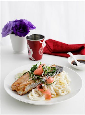 simsearch:649-06352937,k - Plate of fish and pasta on table Stock Photo - Premium Royalty-Free, Code: 649-09003346