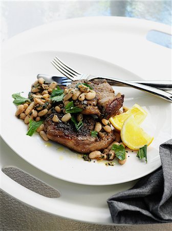 simsearch:649-06352937,k - Plate of meat with beans and lemon Stock Photo - Premium Royalty-Free, Code: 649-09003418