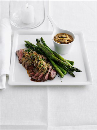 simsearch:649-06352937,k - Plate of meat with asparagus and sauce Stock Photo - Premium Royalty-Free, Code: 649-09003419
