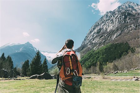 simsearch:649-08086253,k - Rear view of male boulderer photographing mountains, Lombardy, Italy Stock Photo - Premium Royalty-Free, Code: 649-09016808