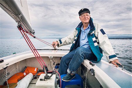 senior man man - Man in boat on Lake Leman, Geneva, Switzerland Stock Photo - Premium Royalty-Free, Code: 649-09025783