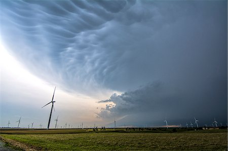 Supercell storm with shelf cloud over wind turbines, Oklahoma, USA Stock Photo - Premium Royalty-Free, Code: 649-09025846