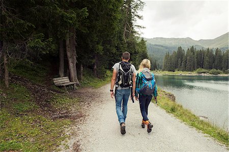 Rear view of couple hiking by lake, Tirol, Steiermark, Austria, Europe Stock Photo - Premium Royalty-Free, Code: 649-09026056