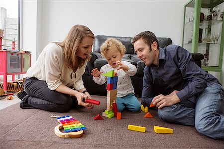 simsearch:649-03667431,k - Parents and baby boy playing with building blocks Stock Photo - Premium Royalty-Free, Code: 649-09078035