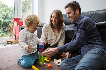 simsearch:649-03667431,k - Parents and baby boy playing with building blocks Stock Photo - Premium Royalty-Free, Code: 649-09078036