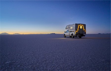 Recreational vehicle, travelling at dusk, across salt flats, Salar de Uyuni, Uyuni, Oruro, Bolivia, South America Stock Photo - Premium Royalty-Free, Code: 649-09123261