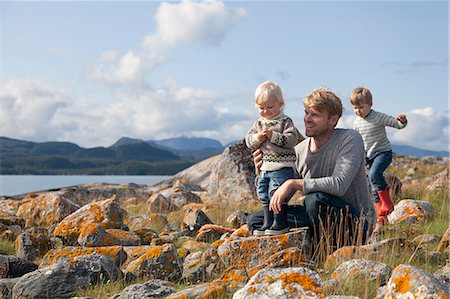 simsearch:649-07437107,k - Man with sons playing by fjord, Aure, More og Romsdal, Norway Stock Photo - Premium Royalty-Free, Code: 649-09138969
