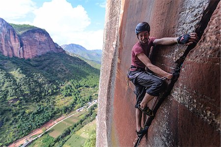 rock climber (male) - Rock climber climbing sandstone rock, Liming, Yunnan Province, China Stock Photo - Premium Royalty-Free, Code: 649-09148476