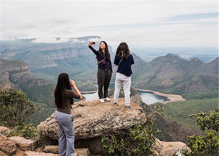 rock formation mpumalanga - Three young female tourists looking out and taking selfie from The Three Rondavels, Mpumalanga, South Africa Stock Photo - Premium Royalty-Free, Code: 649-09156184