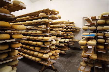 simsearch:649-06164558,k - Ageing room where hard cheeses are stored to mature Photographie de stock - Premium Libres de Droits, Code: 649-09156368