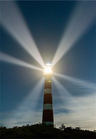 Lighthouse rotating beams at night, Island of Ameland, Hollum, Friesland, Netherlands Stock Photo - Premium Royalty-Free, Code: 649-09159058