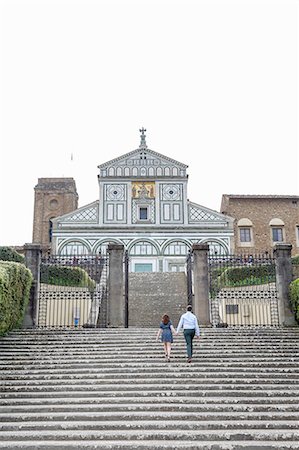simsearch:649-07560084,k - Young couple ascending steps, San Miniato al Monte Church, Florence, Toscana, Italy Stock Photo - Premium Royalty-Free, Code: 649-09159123