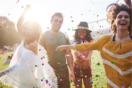 simsearch:649-08117852,k - Young adult friends throwing and dancing in confetti at Holi Festival Foto de stock - Sin royalties Premium, Código: 649-09166404