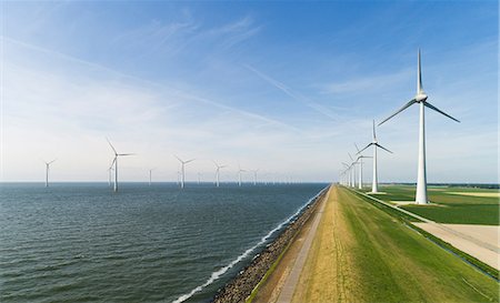 Onshore and offshore wind farm in dutch polder, Urk, Flevoland, Netherlands Fotografie stock - Premium Royalty-Free, Codice: 649-09166914