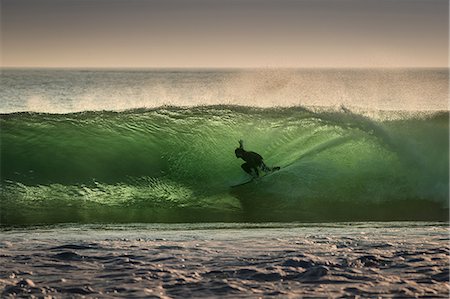 Surfer surfing on barreling wave, Crab Island, Doolin, Clare, Ireland Stock Photo - Premium Royalty-Free, Code: 649-09166996