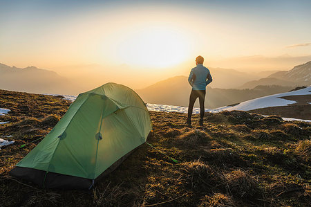 Hiker camping on French Alps, Parc naturel régional du Massif des Bauges, Chatelard-en-Bauges, Rhone-Alpes, France Stock Photo - Premium Royalty-Free, Code: 649-09196041