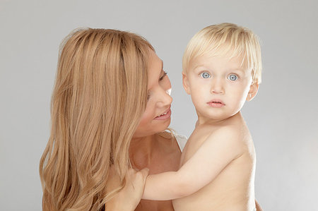 simsearch:632-03027302,k - Mother holding surprised baby boy Stock Photo - Premium Royalty-Free, Code: 649-09206249