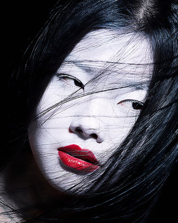 simsearch:649-07520416,k - Young woman with dramatic makeup, white face and red lipstick Stock Photo - Premium Royalty-Free, Code: 649-09206718