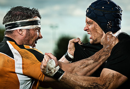 rugby player mud - Rugby players grappling with each other Stock Photo - Premium Royalty-Free, Code: 649-09206891