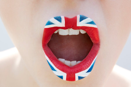 simsearch:649-07436630,k - Close up of female mouth with union jack lipstick Stock Photo - Premium Royalty-Free, Code: 649-09207465