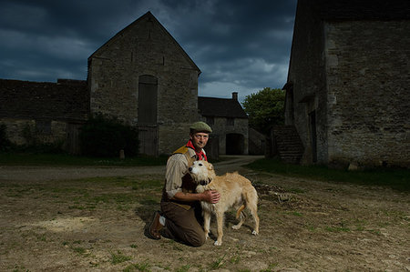 simsearch:649-07560533,k - Portrait of mature traditional farmer and his lurcher dog Photographie de stock - Premium Libres de Droits, Code: 649-09207738