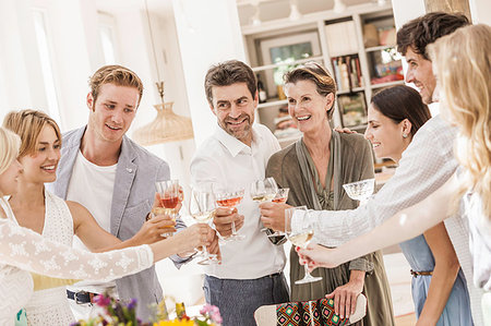 simsearch:649-03858052,k - Family making a toast at birthday party Stock Photo - Premium Royalty-Free, Code: 649-09208307