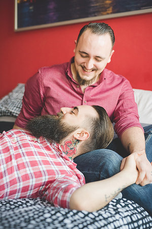 Gay couple chatting in bedroom Stock Photo - Premium Royalty-Free, Code: 649-09208857