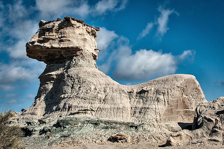 egyptian sphynx cat - Low angle view of sphynx cat rock formation, Valle de la Luna, San Juan Province, Argentina Stock Photo - Premium Royalty-Free, Code: 649-09209241